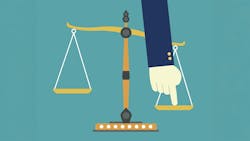 Hand pushing scale out of balance Hand pushing scale out of balance