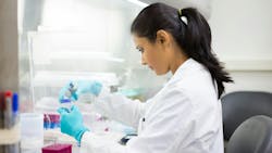 scientist working in lab scientist working in lab