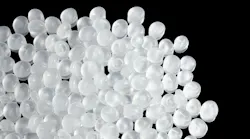 Close up picture of polypropylene granules, selective focus.