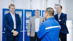 Nouryon CEO (center) talks with employees at site Nouryon CEO (center) talks with employees at site