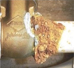 Figure 1. Galvanic corrosion of a steel pipe connected to a brass valve. Figure 1. Galvanic corrosion of a steel pipe connected to a brass valve.