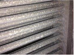 Figure 3. White rust adheres to galvanized steel surfaces and can become very destructive if unaddressed Figure 3. White rust adheres to galvanized steel surfaces and can become very destructive if unaddressed