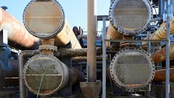 Four Two way heat exchangers shell and tubes opened for repairing and deposits cleaning with high-pressure hydraulic unit. Four Two way heat exchangers shell and tubes opened for repairing and deposits cleaning with high-pressure hydraulic unit.