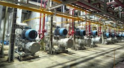 row of reciprocating compressors in a an industrial plant row of reciprocating compressors in a an industrial plant