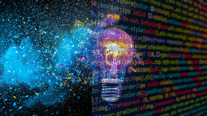 Image of a lightbulb with open source code behind it