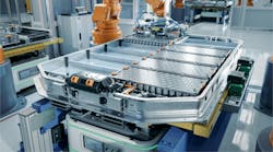 EV Battery Pack on Production Line Equipped with Robot Arms inside Modern Factory EV Battery Pack on Production Line Equipped with Robot Arms inside Modern Factory