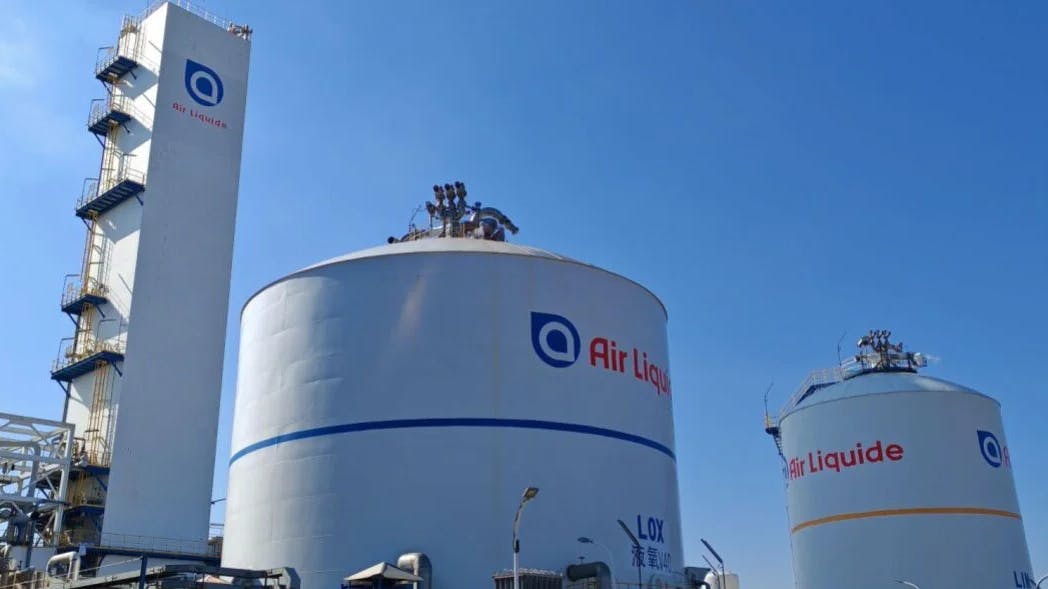Air Liquide logo on chemical storage vessels at Air Liquide chemical facility