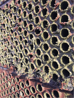 Figure 7. Two-pass heat exchanger on a phosphate-phosphonate program prior to a change in treatment chemistry to a non-phosphorus (non-P) program. Figure 7. Two-pass heat exchanger on a phosphate-phosphonate program prior to a change in treatment chemistry to a non-phosphorus (non-P) program.