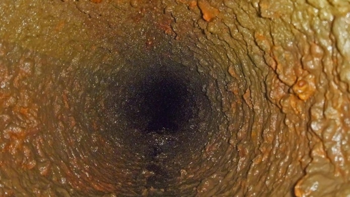 Sedimentation of Scale Calcium Carbonate, sludge and Corrosion products in the main pipeline of the cooling system