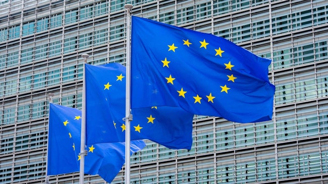 Three flags of the European Union fly in front of the Berlaymont building in Brussels, the seat of the European Commission. (Alicia Windzio/dpa/TNS)