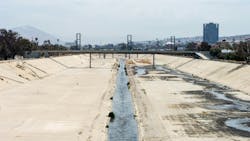 Tijuana river under a bridge with the colored hill (cerro colorado) in the background. Tijuana river under a bridge with the colored hill (cerro colorado) in the background.