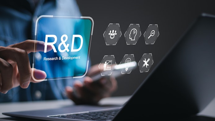 R and D, Research and Development concept. businessman use laptop with virtual R and D icons for research and development of business science technology.