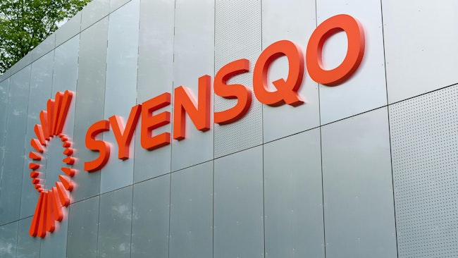 Syensqo headquarters logo on side of building