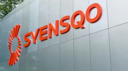 Syensqo headquarters logo on side of building