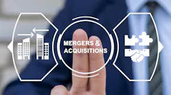 Man working on virtual touch screen presses text: MERGERS AND ACQUISITIONS.