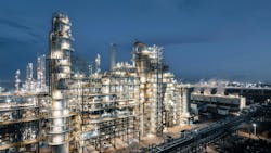 Industrial chemical plant equipment and pipelines at night view. Industrial chemical plant equipment and pipelines at night view.