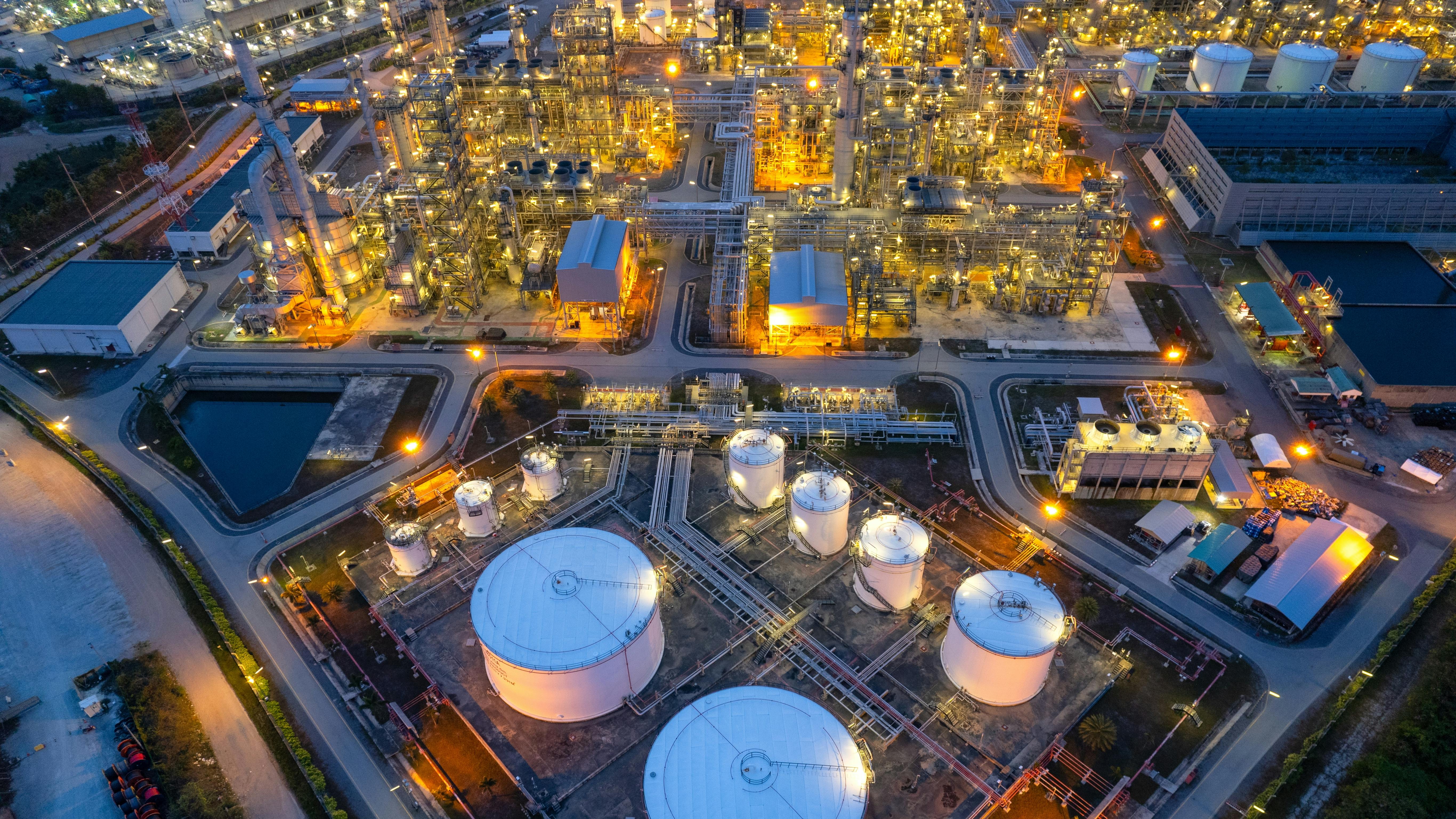 aerial view of oil and gas plant at dusk