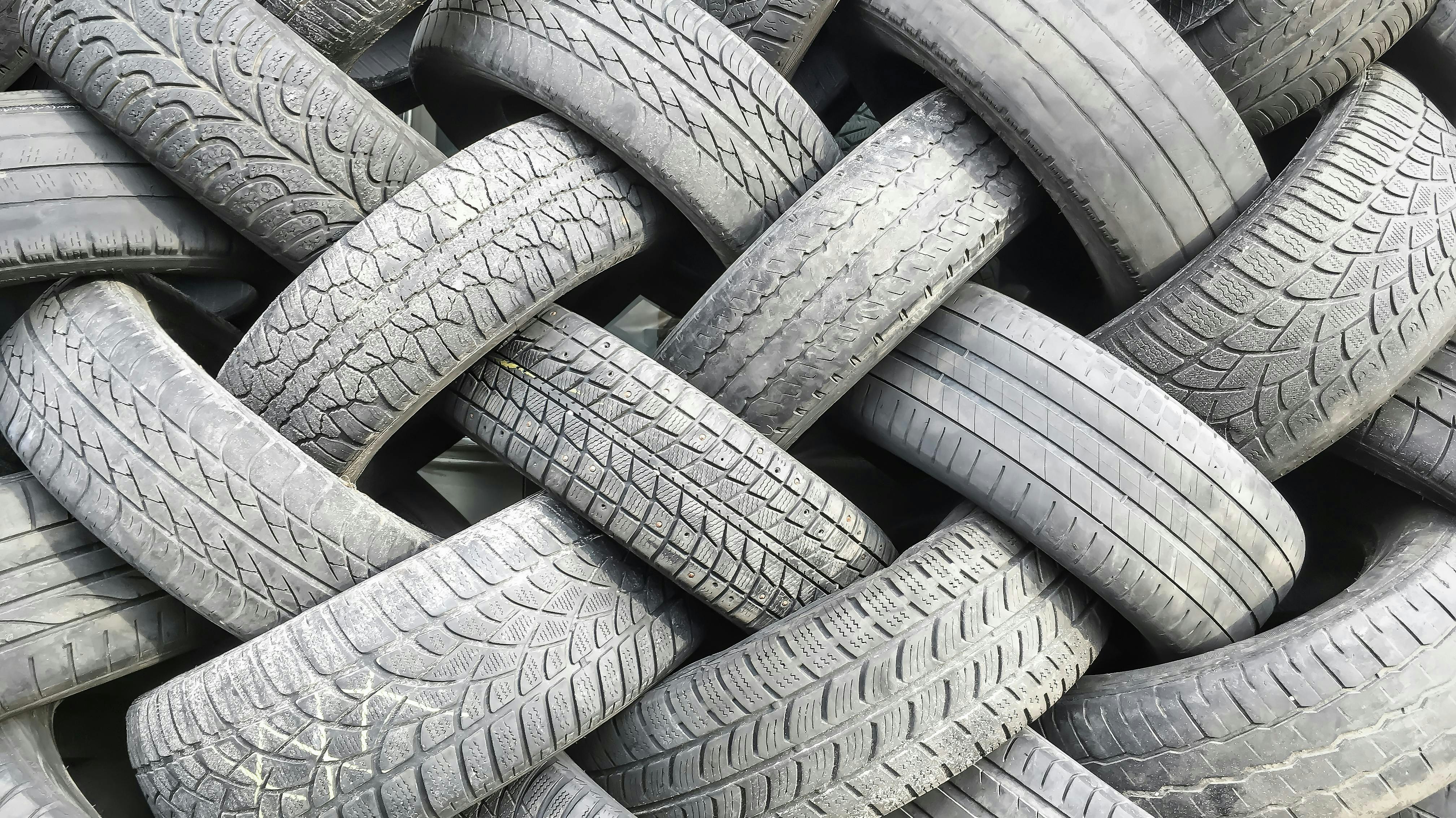 A pile of old used tires close-up