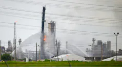 Baytown, Texas - July 31, 2019: Firefighters battle blaze after explosion at the ExxonMobil Baytown Olefins chemical plant in Baytown, near Houston Texas