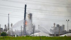 Baytown, Texas - July 31, 2019: Firefighters battle blaze after explosion at the ExxonMobil Baytown Olefins chemical plant in Baytown, near Houston Texas Baytown, Texas - July 31, 2019: Firefighters battle blaze after explosion at the ExxonMobil Baytown Olefins chemical plant in Baytown, near Houston Texas