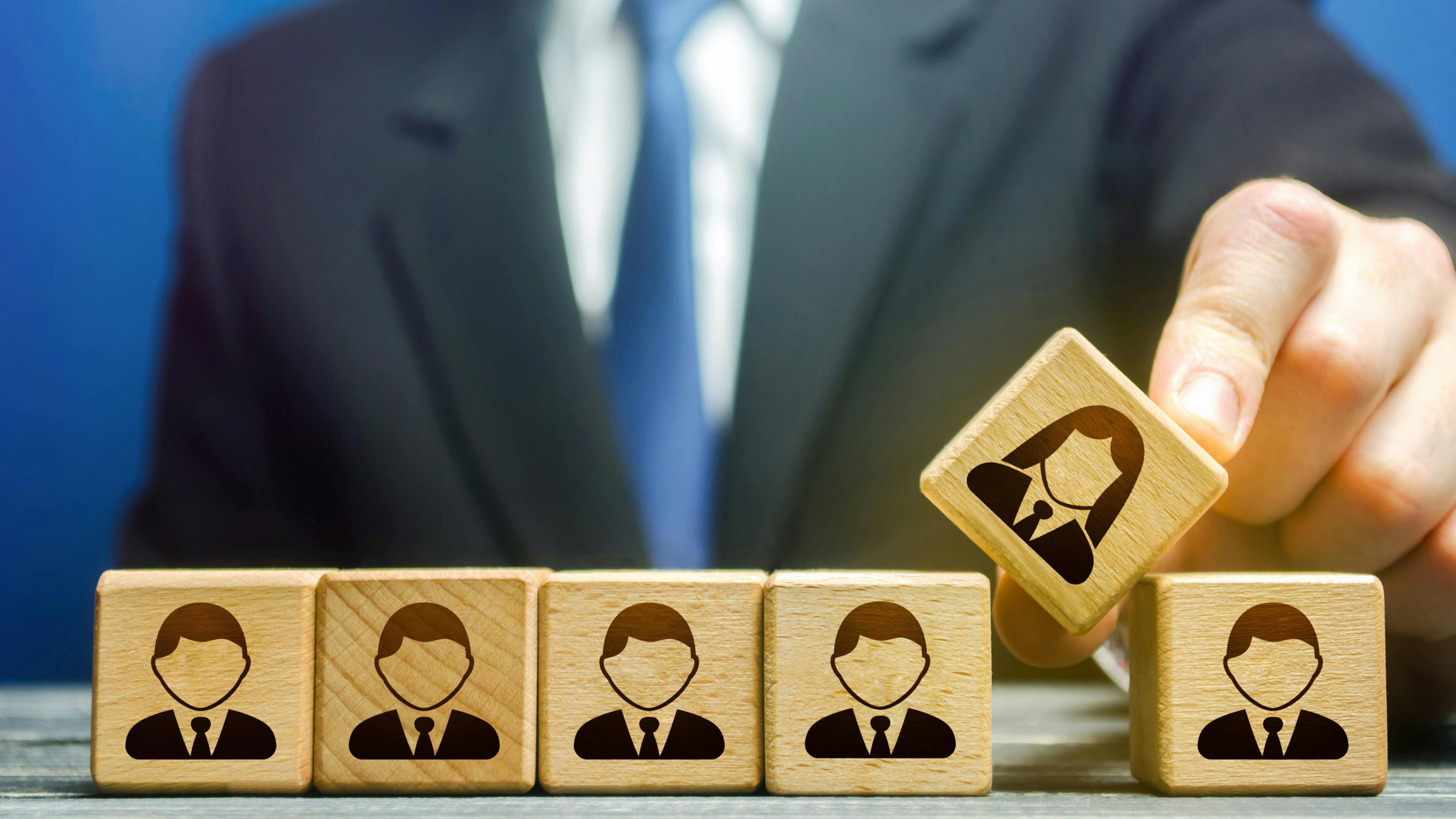 The leader integrates the female employee into the male staff team. Gender imbalance, creation gender balance in the company to improve work efficiency.