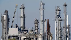 Industrial plants stand on the factory premises of a chemical company. Industrial plants stand on the factory premises of a chemical company.