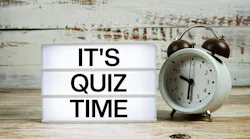 It's Quiz Time marquee with an alarm clock to introduce a trivia quiz for chemical engineers