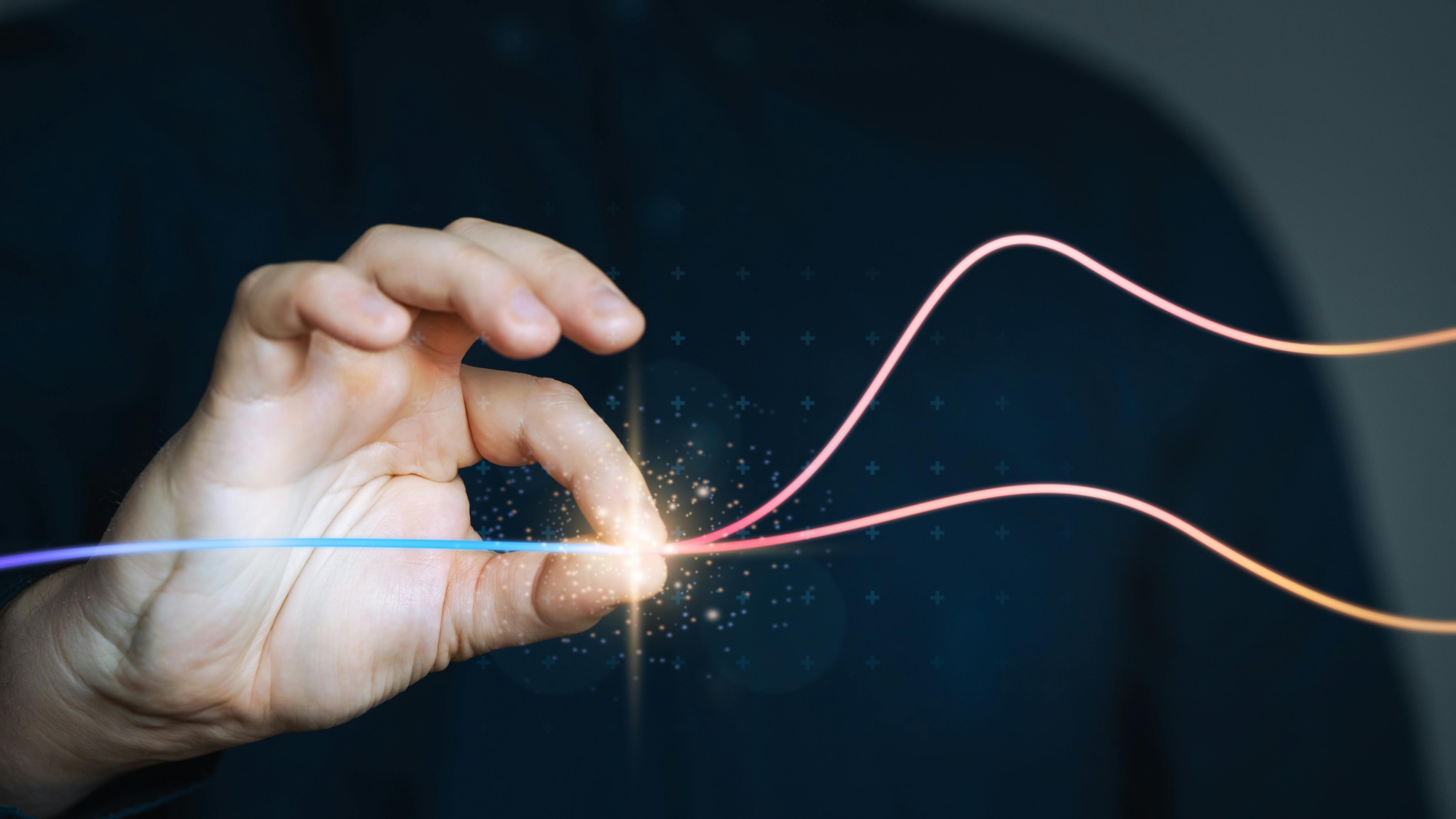 Hand 'pinches' digital wave thread, concept for pinch analysis