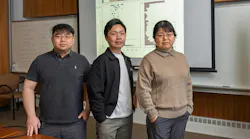 Researchers at Brookhaven Lab developed a machine learning framework to search for ideal catalysts. From left to right: Wenjie Liao, An Nguyen, and Ping Liu, share data from a case study that tested the framework in a new paper in Chem Catalysis. (Timothy Kuhn/Brookhaven National Laboratory)