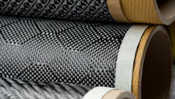 Black carbon fiber composite raw material close up background Black carbon fiber composite raw material close up background