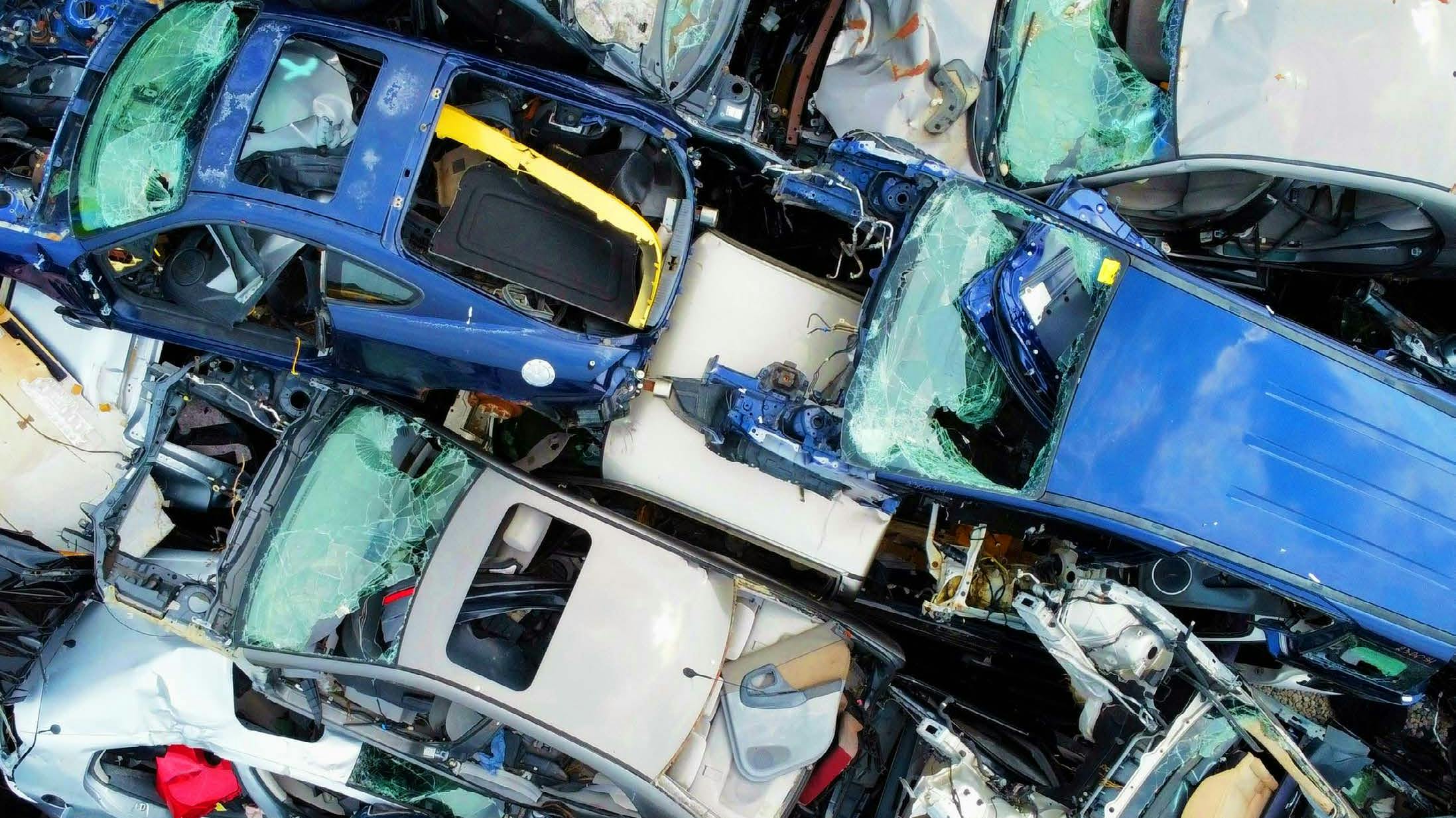 Aerial view of pile of end-of-life vehicles. Source: GIC Automotive Plastics Circularity Report