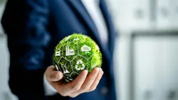 Businessman holding green ball made of grass, surrounded by environment icons. Businessman holding green ball made of grass, surrounded by environment icons.