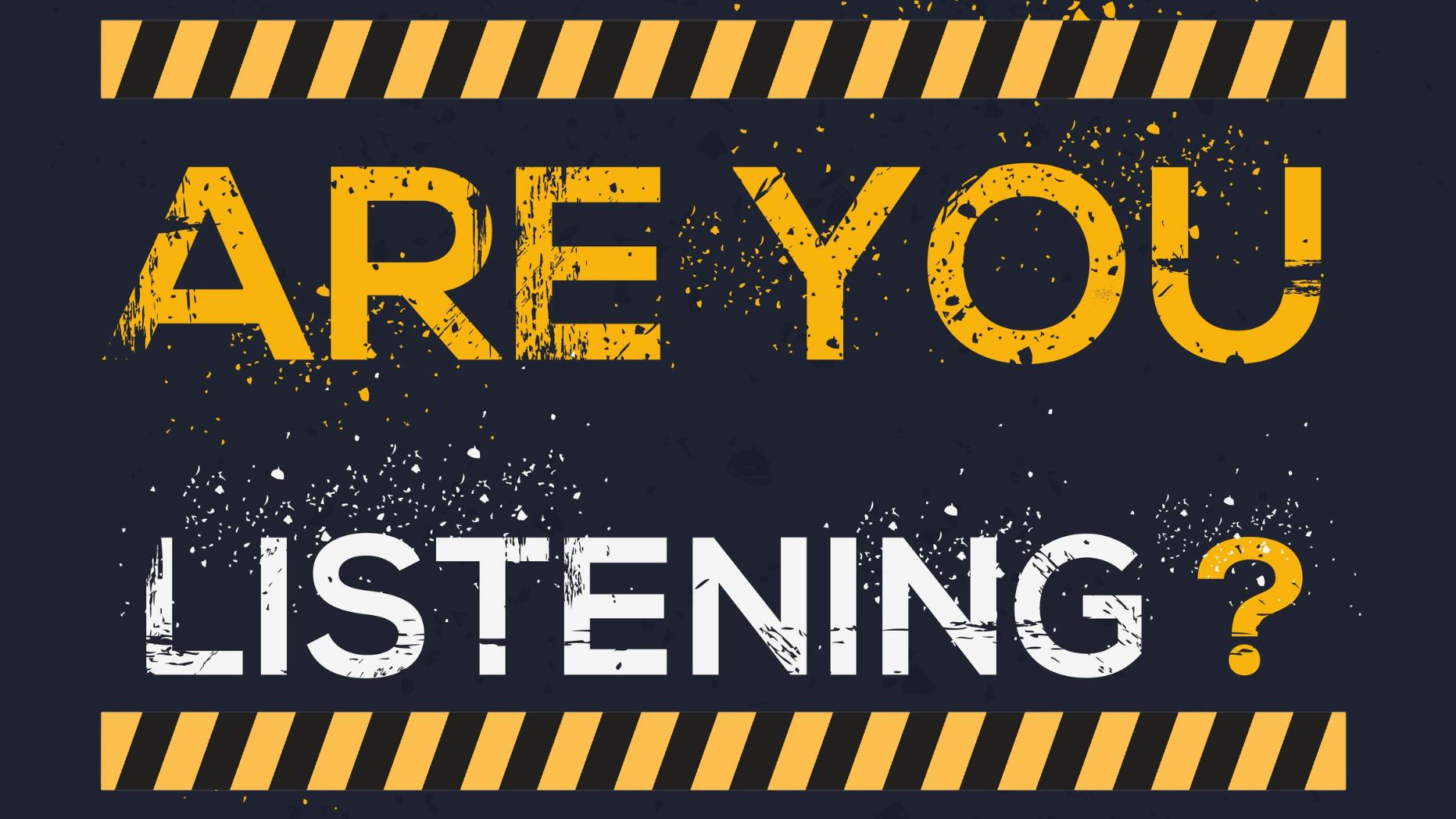 Are You Listening? copy text with a spray painted look on asphalt and caution stripes bordering the phrase