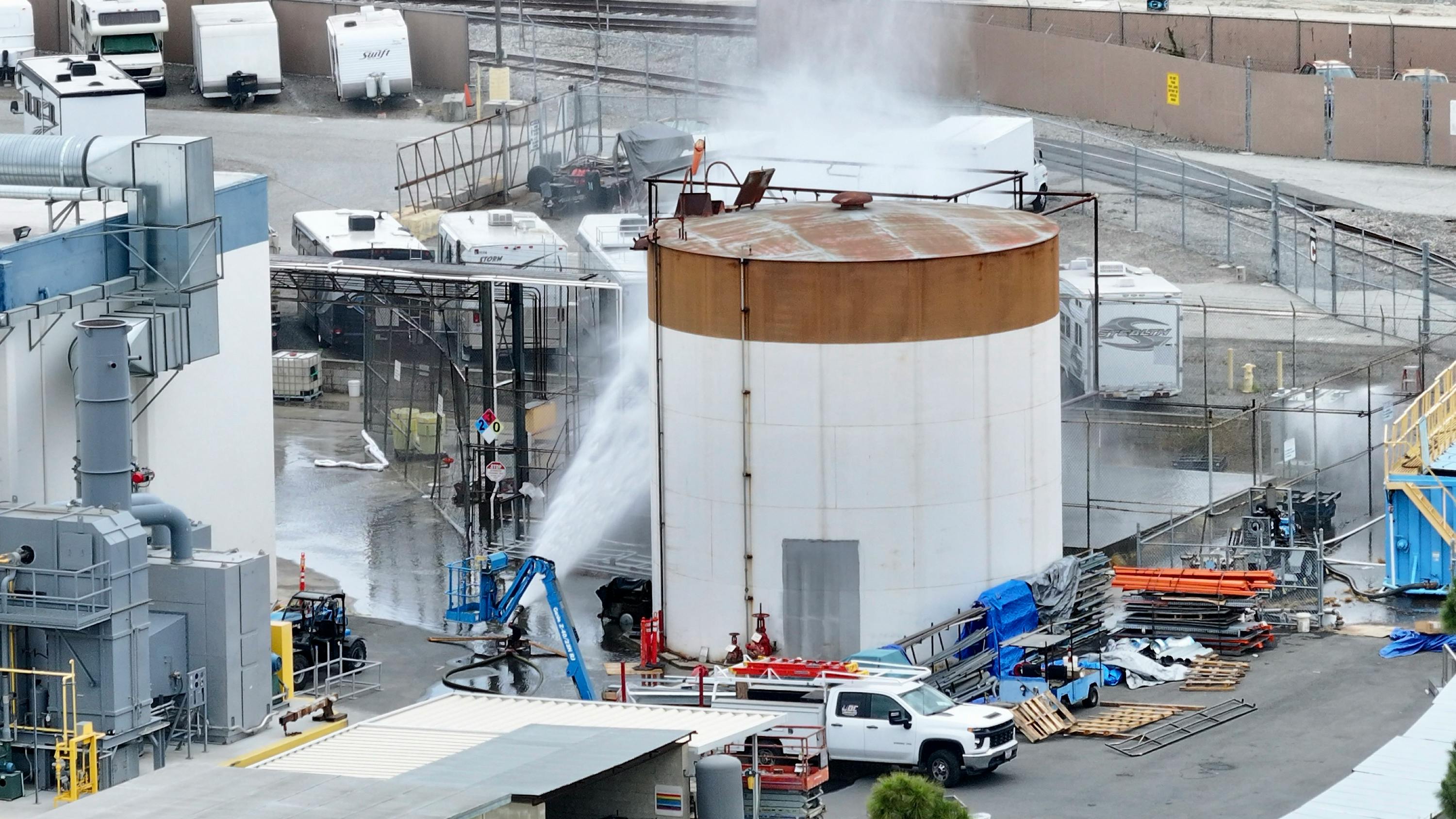 Water is sprayed on a 34,000-gallon tank that overheated at GKN Aerospace in Garden Grove, California, on Friday, May 22, 2026. (Jeff Gritchen/Orange County Register/TNS)