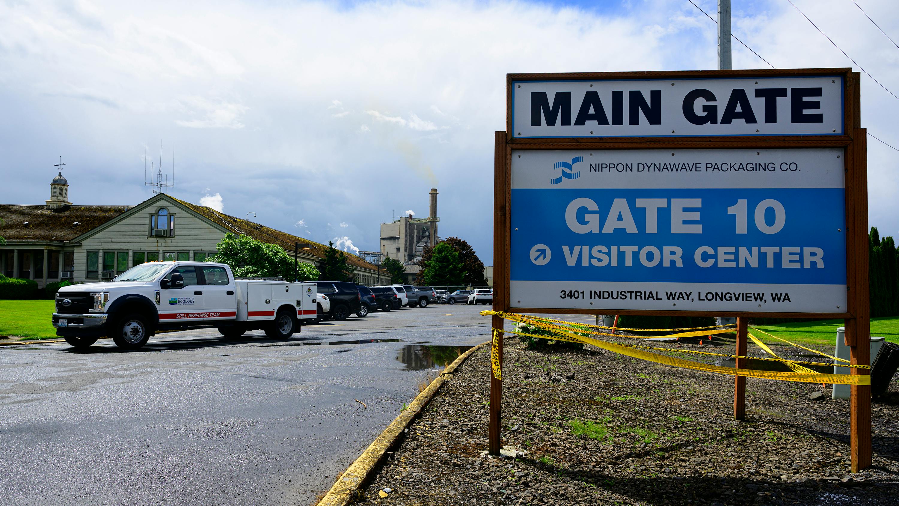 Emergency responders from the Spill Response Team attend to the scene in front of the Nippon Dynawave Packaging facility following a fatal chemical storage tank implosion on Tuesday, May 26, 2026, in Longview, Washington. (Mathieu Lewis-Rolland/Getty Images/TNS)