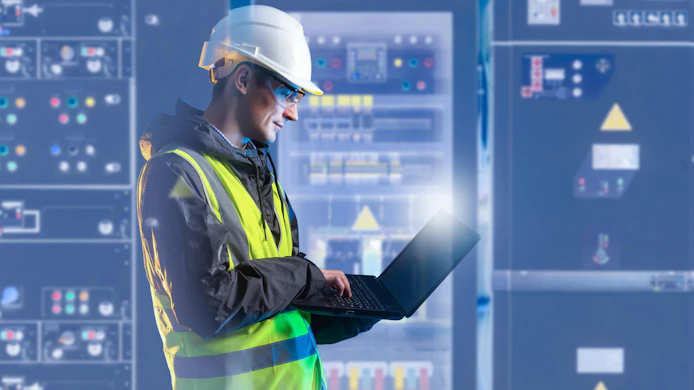 Electrical engineering, technician monitors control panels and analyzes system data on laptop. Industrial power equipment operation, safety inspection and maintenance in energy facility.