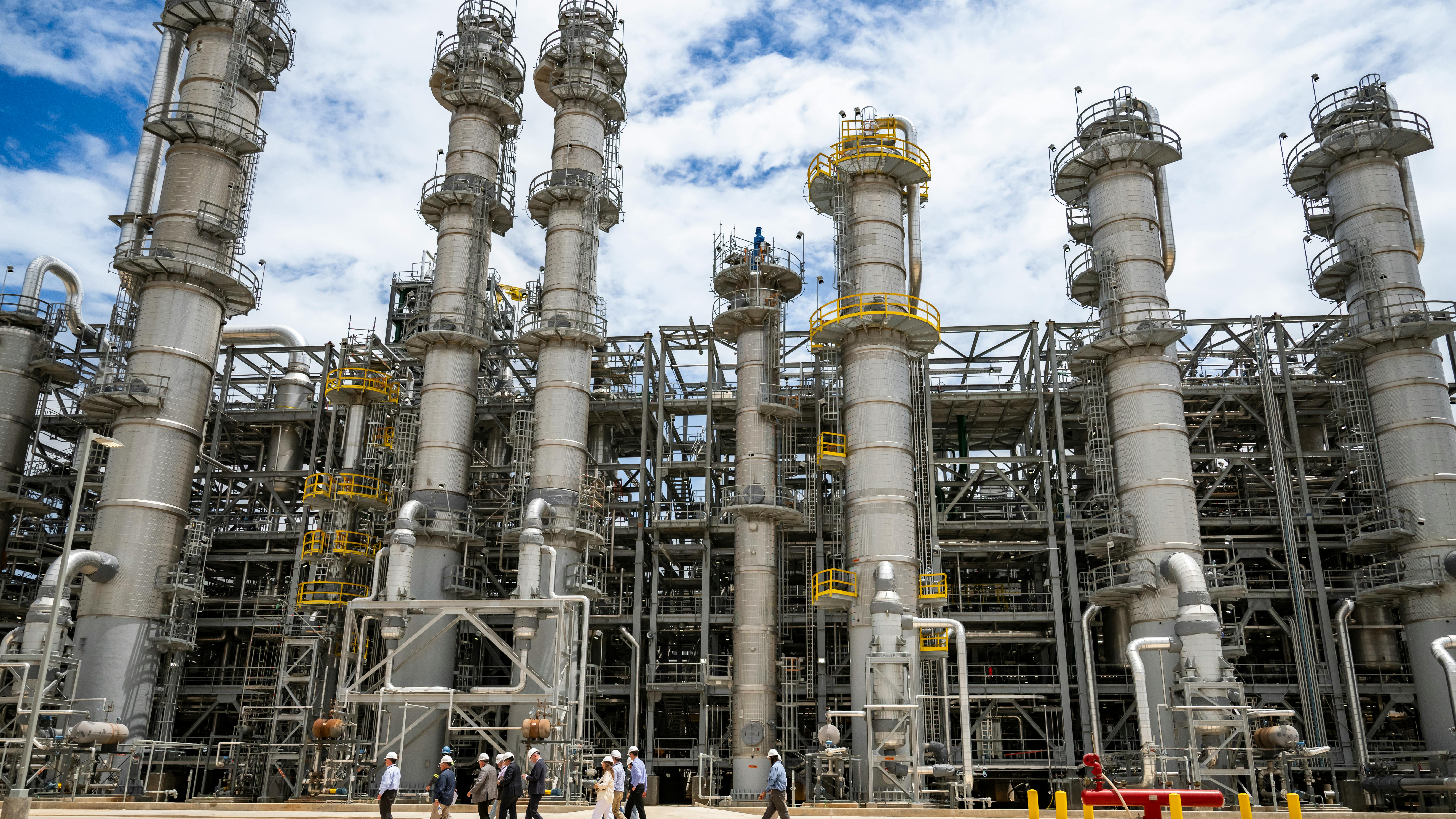 Rohm full scale Bay City, Texas MMA plant with distillation towers in view against blue sky