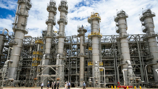 Rohm full scale Bay City, Texas MMA plant with distillation towers in view against blue sky