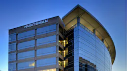 Huntsman headquarters building in The Woodlands, Texas against a blue sky Huntsman headquarters building in The Woodlands, Texas against a blue sky