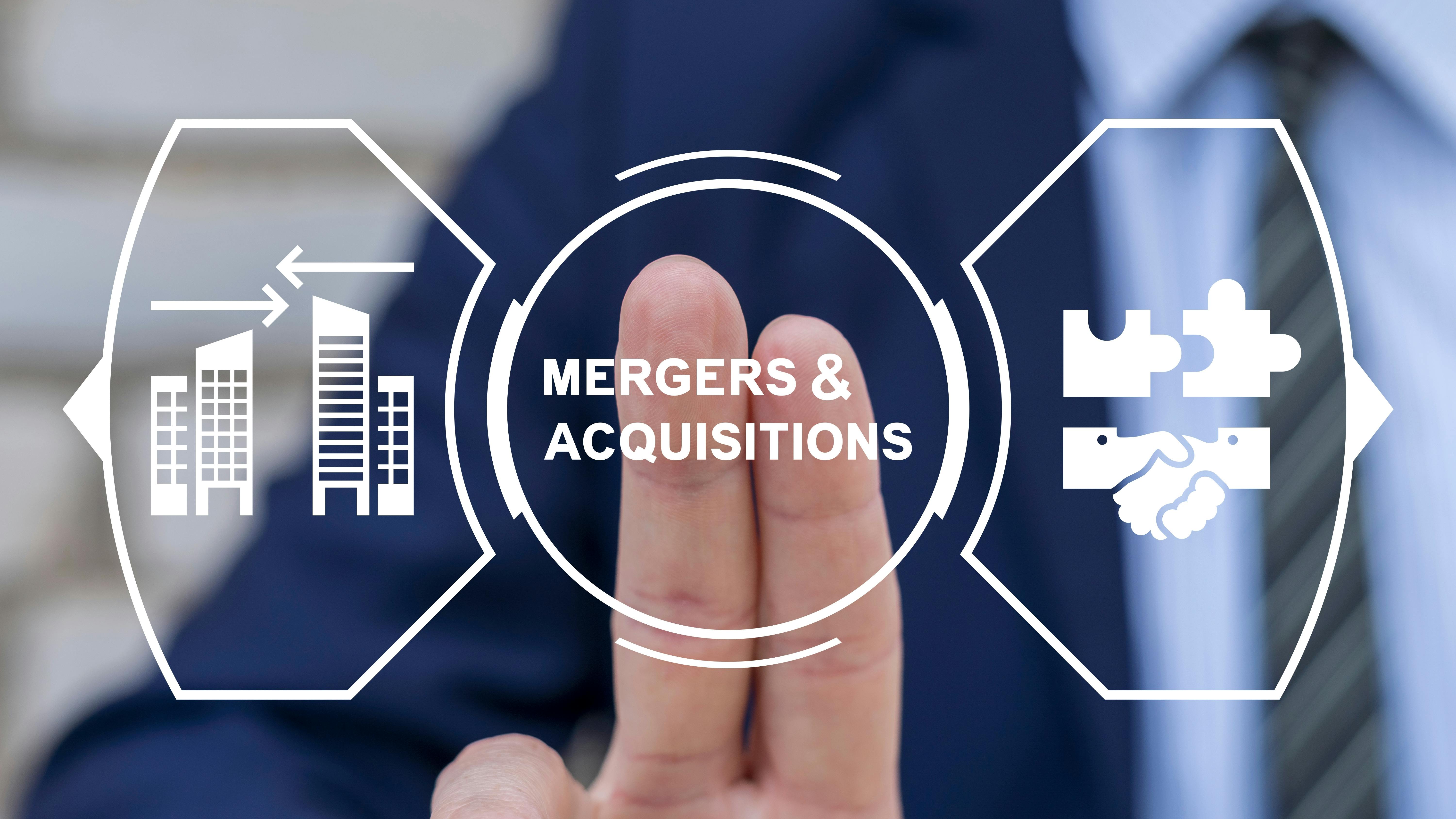 Two fingers press on digital icon and text representing Mergers & Acquisitions