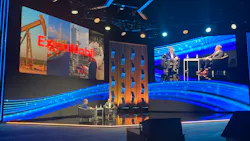 Dylan Pugh of ExxonMobil and Vincent Servello of AspenTech on stage at Optimize 26 in Houston