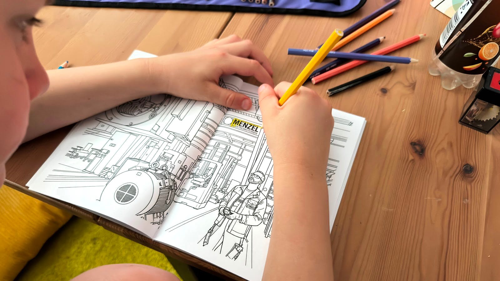 Based on photographs from Menzel's shopfloor, the coloring book offers a vivid glimpse into the world of large electric motor manufacturing