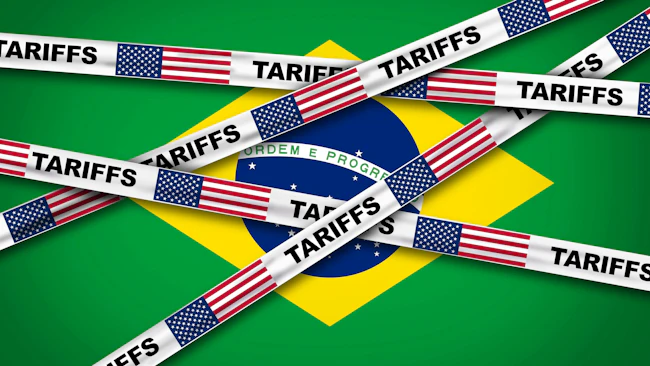 Illustration of the Brazilian flag partially covered by tape strips labeled &lsquo;Tariffs&rsquo; featuring U.S. flags, symbolizing U.S. trade tariffs on Brazilian imports and trade tensions between the two countries.