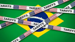 Illustration of the Brazilian flag partially covered by tape strips labeled ‘Tariffs’ featuring U.S. flags, symbolizing U.S. trade tariffs on Brazilian imports and trade tensions between the two countries.