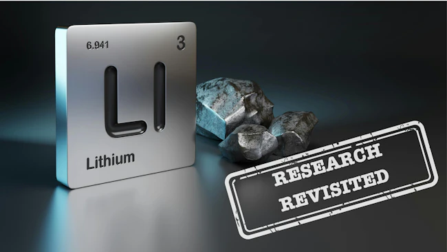 Research revisited stamped over image of Lithium element symbol from the periodic table near metallic lithium