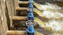 Blue pumps and valves discharge industrial wastewater
