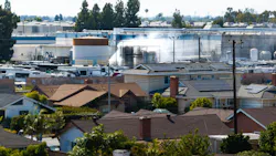 GARDEN GROVE, CA - MAY 24, 2026: An aerial of water being sprayed on large storage tanks at the GKN Aerospace facility on Sunday, May 24, 2026, in Garden Grove, CA. 44,000 people remain evacuated after a 34,000-gallon tank of methyl methacrylate (MMA) leaked at a garden Grove aerospace plastics facility, sending potentially toxic vapors into the air on Thursday.