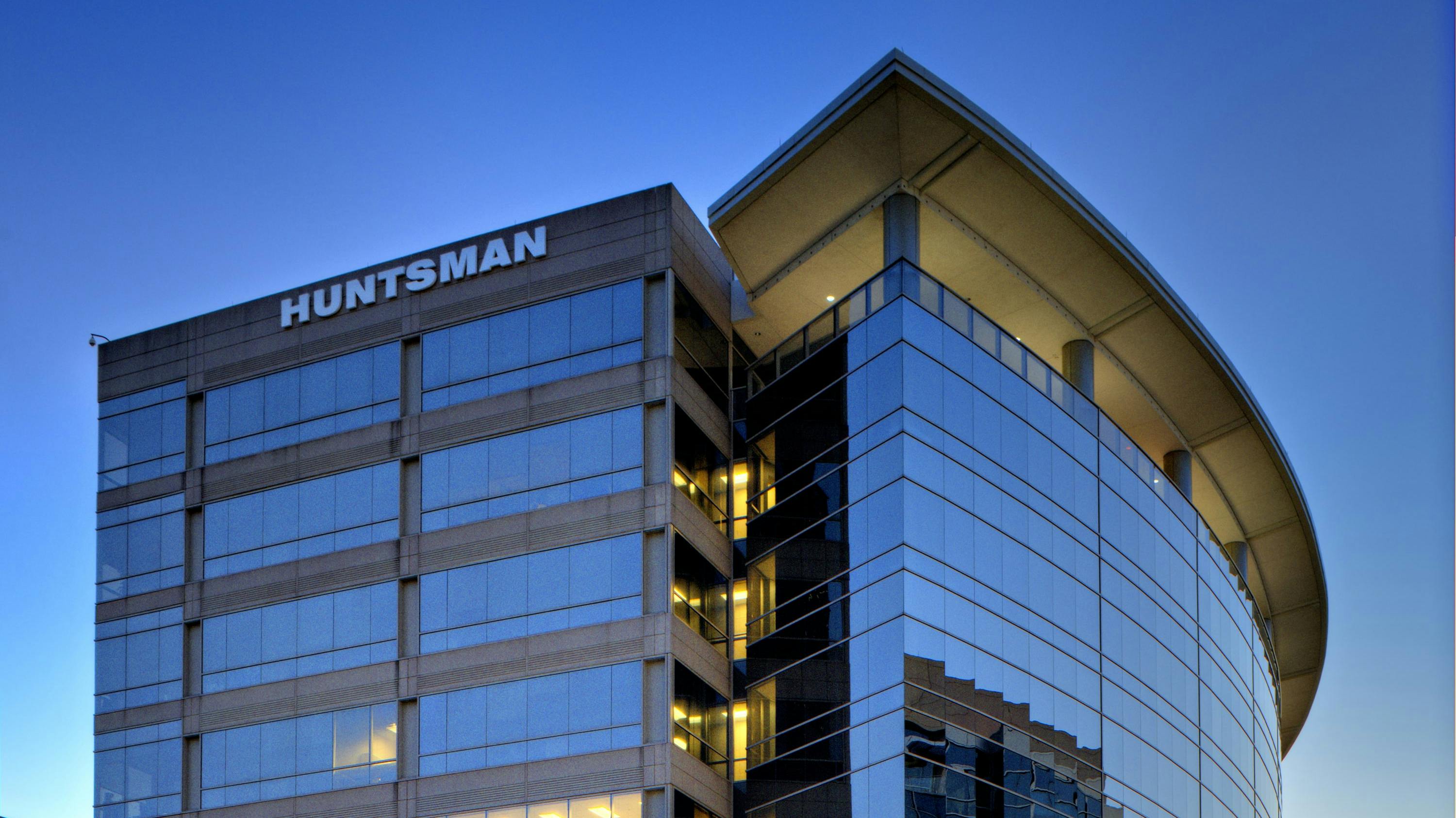 Exterior view of Huntsman headquarters with logo visible on building