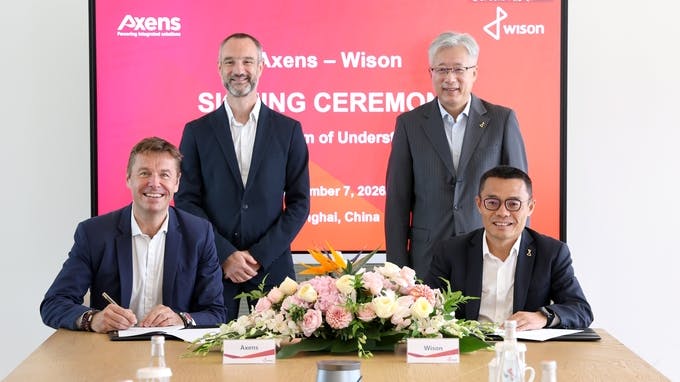 Axens, Wison Engineering executives pose after signing memorandum of understanding
