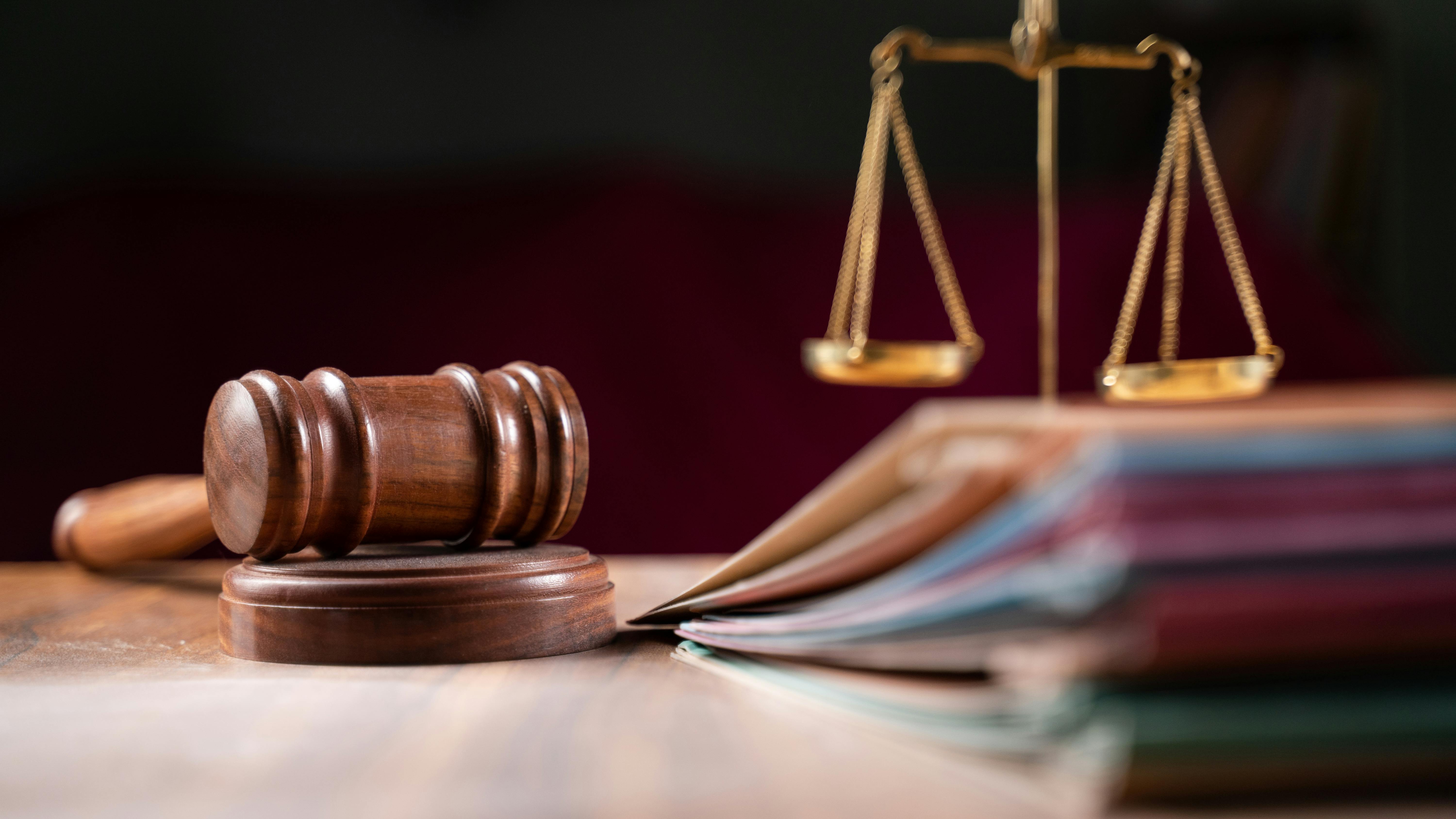 Gavel, files and law scale